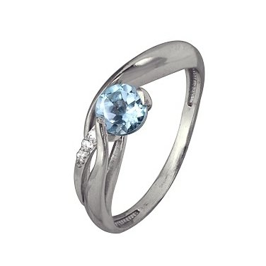 Кольцо из серебра с топазом и фианитами Кольцо из серебра с топазом и фианитами
